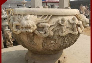古代人物浮雕石水缸