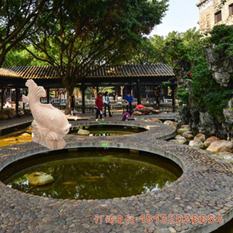 头朝下的喷水鲤鱼石雕